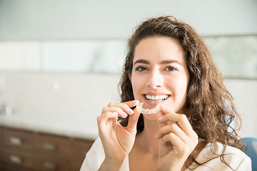Invisalign attachments for misaligned teeth